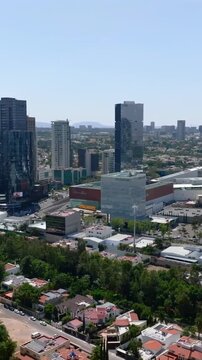 Vertical aerial shot of Paseo Andares featuring Andares Shopping Mall, modern business skyscrapers and luxury district in Zapopan, Guadalajara Metropolitan Area, Jalisco, Mexico