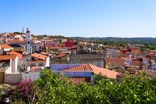 Elevated view over the red-tiled roofs of Sant'Antioco town in Sardinia, Italy