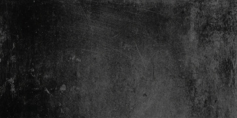 Dark wall scratched blackboard texture background with white chalk marks and smudges for design and education concepts © Namira