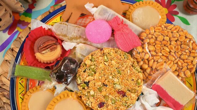 Top view of traditional Mexican treats and colorful candies