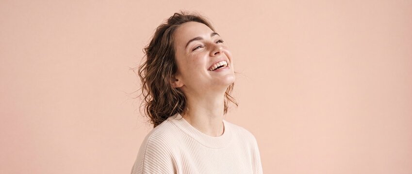 Happy Young Woman Looking Up Concept