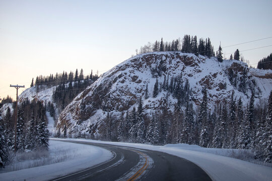 Snowy hill on a highway in Alaska