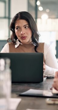 Woman, discussion and meeting in office with laptop, planning and sales strategy for insurance agency. Person, team and speaking in business with computer, advice or explain how to sell policy cover.