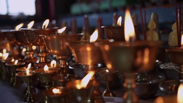 A Shot of Traditional Butter Lamps Burning Inside Tawang Monastery, Arunachal Pradesh