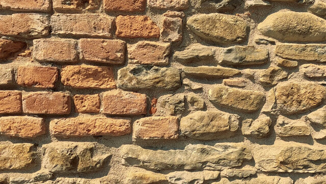 Close-up of Rustic Stone and Red Brick Wall in Monforte d'Alba