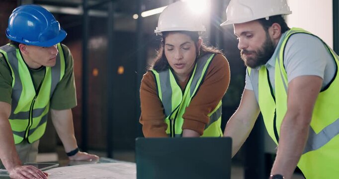 Architect, planning and construction team with blueprint, laptop and maintenance strategy. People, engineer and discussion with computer for building codes, design document and flare in office