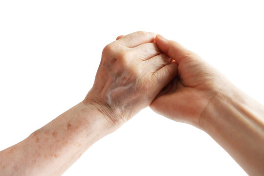 Young and Senior Hands Holding Each Other Isolated on White Background
