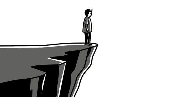 Businessman standing on cliff edge alone.