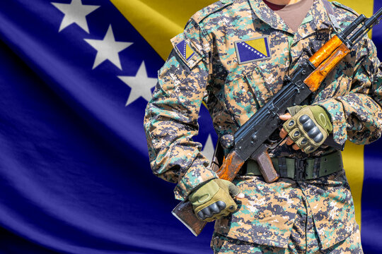 Bosnia and Herzegovina flag with soldier holding assault rifle
