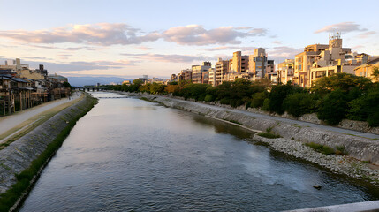 Fototapeta premium Serene River View with Urban Landscape and Evening Sky Reflection