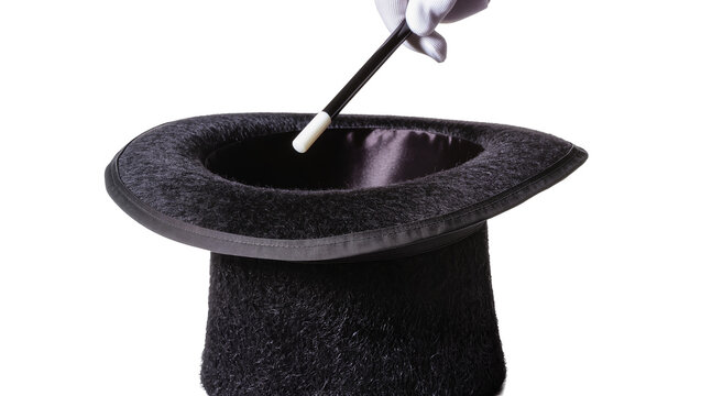White gloved hand holding magic wand over black top hat, isolated on transparent background