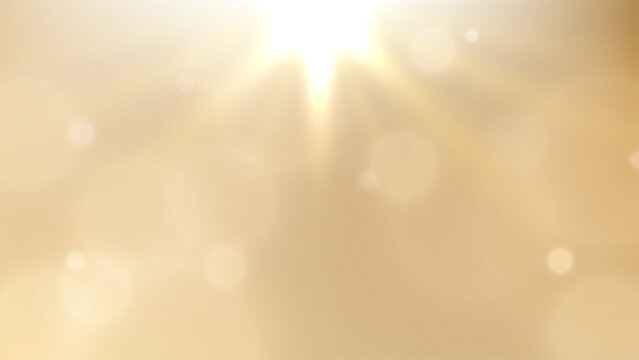 Gold background with bokeh light and sunburst lens flare abstract warm glowing texture, luxury holiday backdrop and wedding invitation card design copy space template