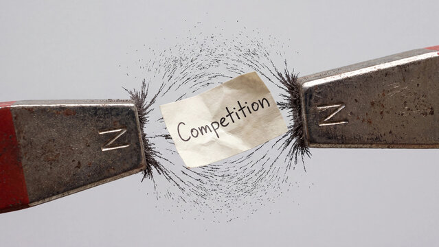 Competition and opposing forces concept representing tension attraction repulsion and balance of power between rival business forces