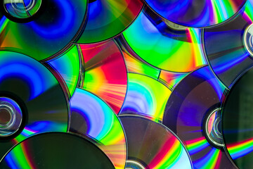 Reflection of the surface of a DVD discs with artistic lighting close-up © Roberto Sorin