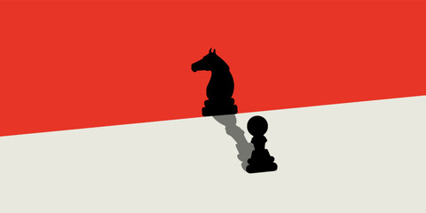 A chess pawn stands under a spotlight that casts a shadow on the knight pawn. © Achmad Sukriyadi