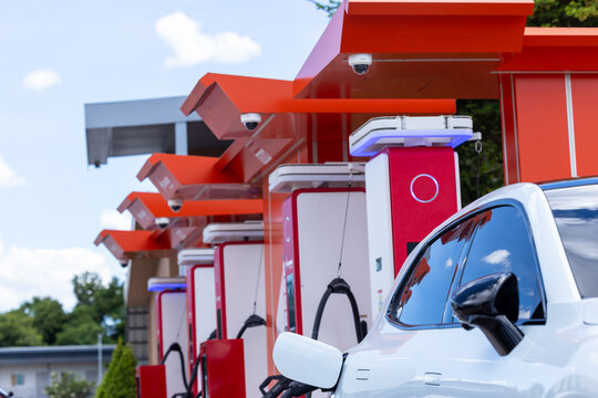BEV car or Battery Electric Vehicle car charging battery at EV station DC fast charge, EV charging station and electric charge battery.