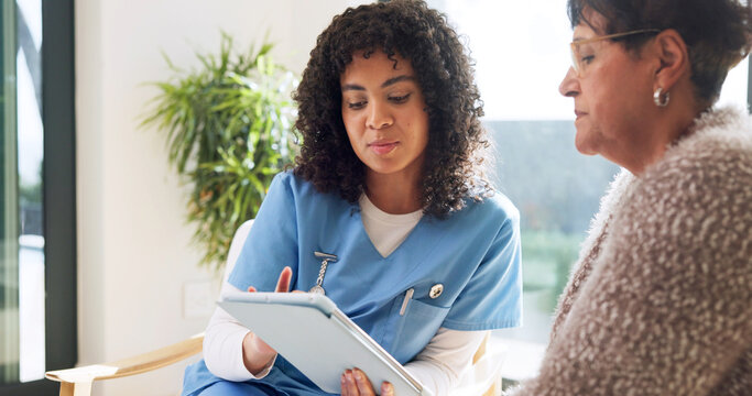 Caregiver, reading and old woman at house with tablet, research or medical report for diagnosis. Nurse, checkup or senior person in home with digital, assisted living and online survey for healthcare