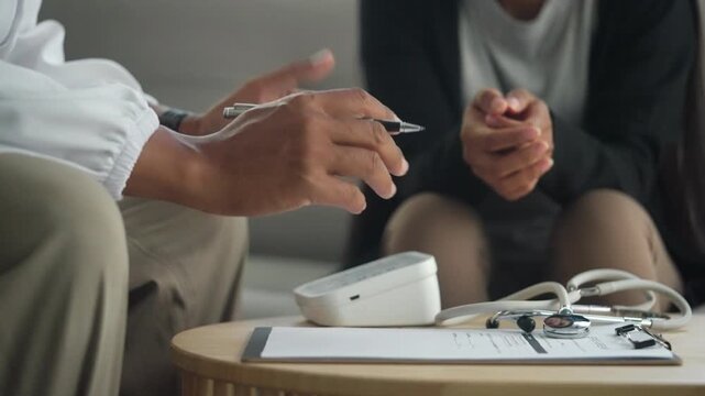 Physician Providing Professional Medical Advice During Patient Consultation