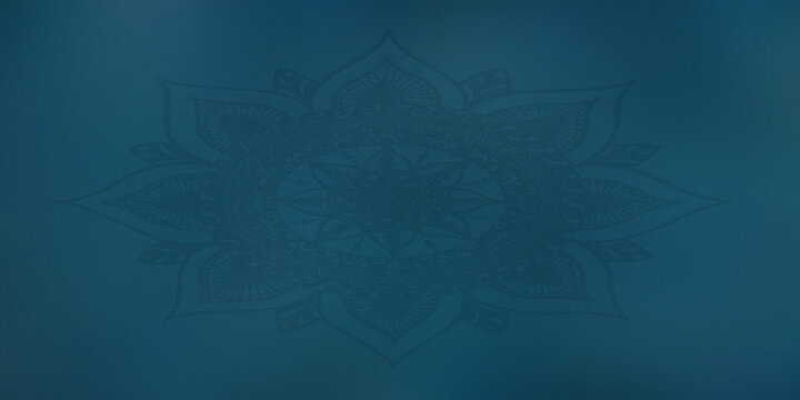 Intricate circular mandala pattern overlay on solid teal blue textured paper background.