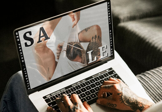 Tattooed Hands Using Laptop Mockup Sale PSD