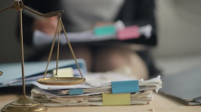 Justice Scales with Legal Case Files and Document Review for Law Firm Compliance