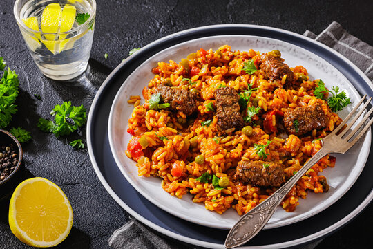 Greek Giouvetsi Rice Platter with Savory Biftekia