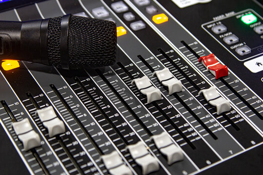 Wireless microphone on a professional mixer.
