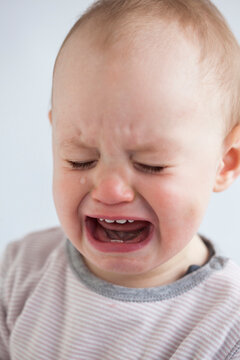Portrait of crying baby girl