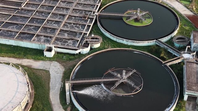 Wastewater treatment plant clarifier tanks processing sewage at municipal water facility