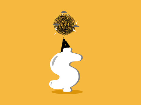 businessman sits dejectedly on a dollar sign