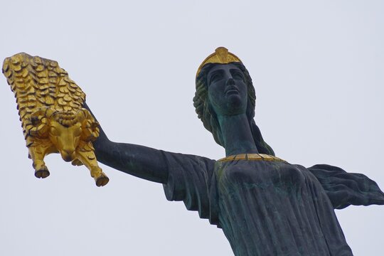 Golden Fleece and Medea statue in Batumi with sky copy space