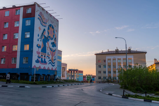 Photo of Anadyr city street with Russian Soviet architecture building, murals and urban landscape in Chukotka, Chukchi Autonomous okrug, Russia.

