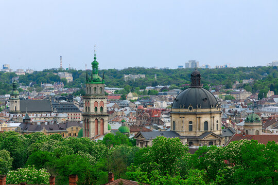 Panoramic view of Lviv historic cityscape with iconic domes and towers showcases the rich architectural heritage