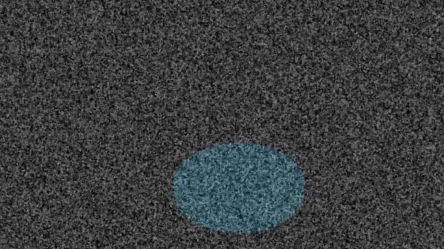 Abstract blue circle moving across dark gritty noise texture background, static