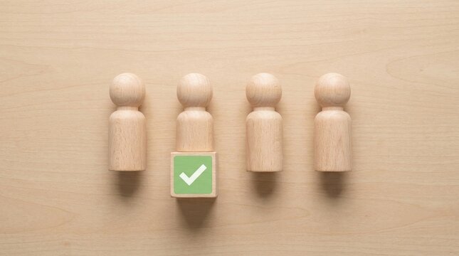 Team selection concept one chosen leader among wooden figures