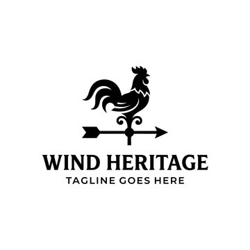 Classic silhouette of a farm rooster weather vane indicating wind direction.