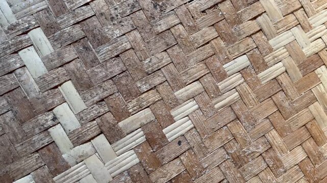 Traditional handcrafted bamboo woven texture background close up