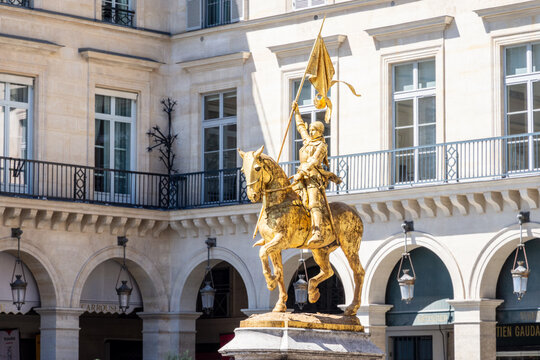 Paris, France - June 17, 2026: Three-quarter front view of the gilded bronze equestrian statue of Joan of Arc by Emmanuel Fremiet, erected in the Pyramides square in 1874.