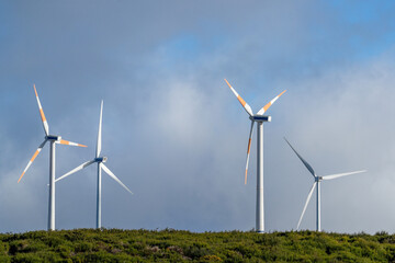 The wheels of a wind turbine are turning on the plateau of Madeira. © Markus Kammermann