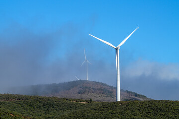 The wheels of a wind turbine are turning on the plateau of Madeira. © Markus Kammermann