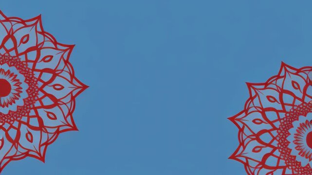 Intricate red floral mandala pattern repeats on a soft blue background with subtle texture