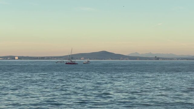 View across the Table Bay harbour area towards Table View and Blouberg, Cape Town, South Africa