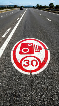 Speed Camera Sign 30mph On Asphalt Highway Road Traffic Law Enforcement Detail