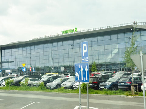 March 25, 2026, Katowice, Poland - Katowice Airport Terminal B Exterior and Parking Area