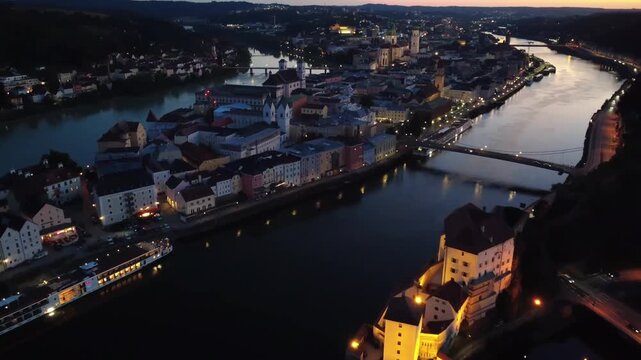 Aerial view of Passau old town and Three Rivers Corner at night