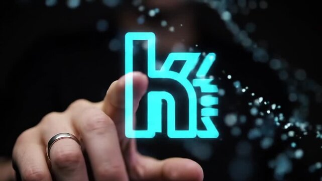 Hand touching glowing blue letter K hologram with digital particles