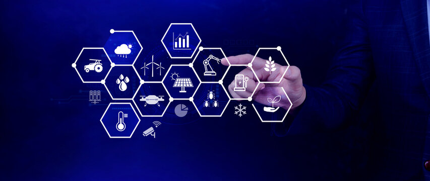 Smart agriculture and agritech concept. Hand using touching digital icons interface of modern farming technology, Agribusiness innovation and smart farming management. not ai