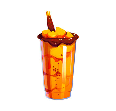 Mangonada Mexican mango chamoy smoothie drink or Mangoneada and Chamoyada. Mexican mango fruit beverage with tamarind sweet candy drinking straw and mango pieces for Mangonada or raspado dessert drink
