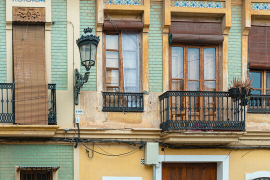 Mediterranean details. Colorful facades of old houses typical of the Caba&ntilde;al neighborhood in Valencia.