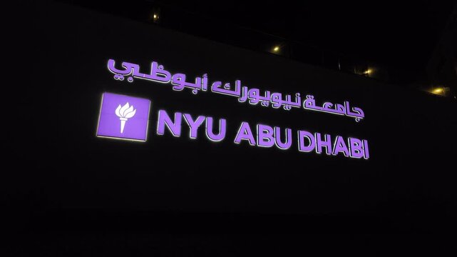 NY University logo displayed with bilingual text in English and Arabic.1